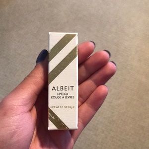 Never used albeit peony colored lipstick